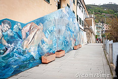 Colourful traditional mural on stone slab in street Editorial Stock Photo