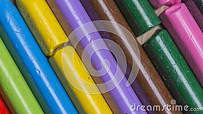 Colourful used crayons in a diagonal row Stock Photo