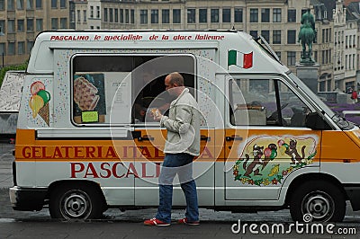 A colourful van from which waffles are sold out Editorial Stock Photo