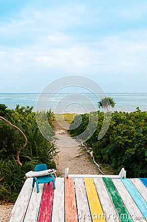 Colourful wooden beach decking at tropical summer island Stock Photo