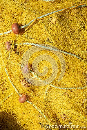 Colourful yellow fishing net Stock Photo