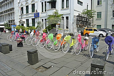 Colourfull bicycles parked for rides at Indonesia Editorial Stock Photo