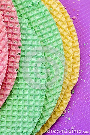 Colourfull waffles. Textured abstract background. Close up. Flat lay Stock Photo
