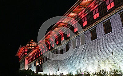 Colourfully lit walls of Thimphu Dzong, Thimphu, Bhutan. Stock Photo