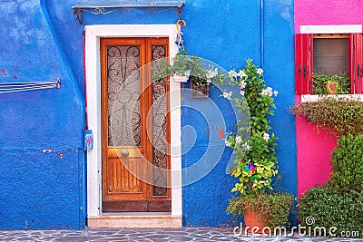 Colourfully painted house facade on Burano Stock Photo