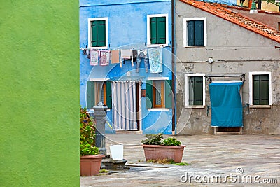 Colourfully painted house facade on Burano island Stock Photo