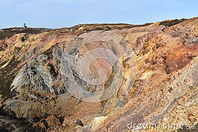 Colours at Parys Mountain Geological landscape with modern winding wheel Amlwch Anglesey Wales Stock Photo