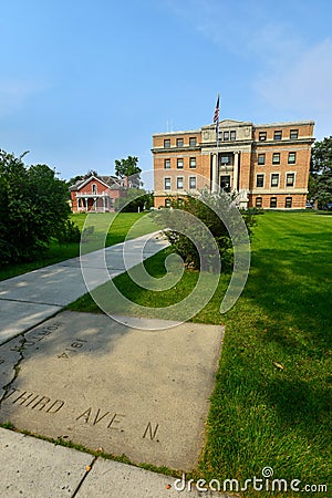 Concrete street marker at the Stillwater County Courthouse in Columbus, Montana, USA Editorial Stock Photo