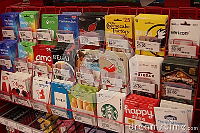 Assorted pre-paid gift cards for different retail vendors. Editorial Stock Photo