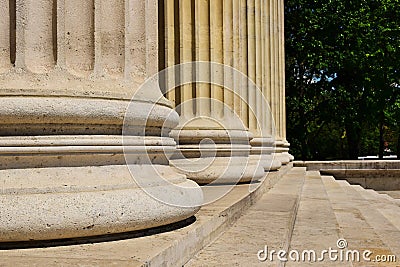 column base closeup in ionic order. diminishing perspective view. ancient greek architecture Stock Photo