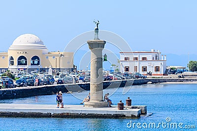 Column with a statue of a deer. Port of Mandraki. Rhodes Island. Greece Editorial Stock Photo