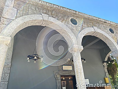 Columns with arches in a wall Arab Stock Photo