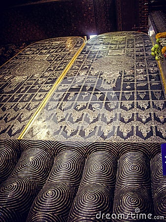 Columns of a dark construction, a temple in Thailand Stock Photo