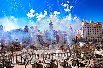 Columns of smoke from a mascleta, a typical daytime fireworks display during the Fallas of Valencia Editorial Stock Photo