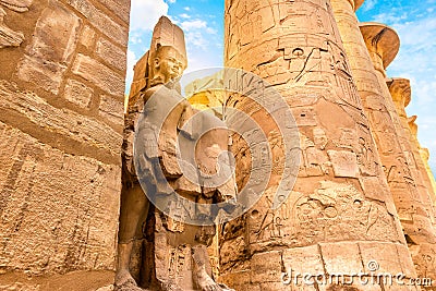 Columns and statue in Karnak Temple Stock Photo