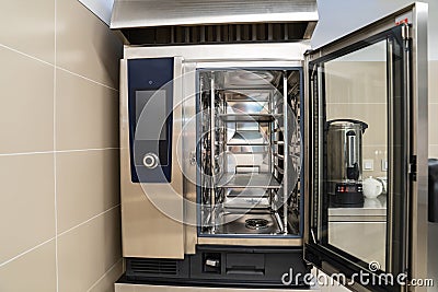 Combi oven is a universal thermal equipment. equipment for public catering. Stock Photo