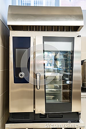 Combi oven is a universal thermal equipment. equipment for public catering. Stock Photo