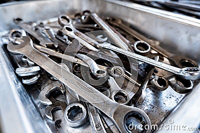 Combination wrenches, spanner, diverse wrench tools in garage Stock Photo