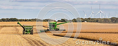 A combine harvester harvesting soybeans Editorial Stock Photo
