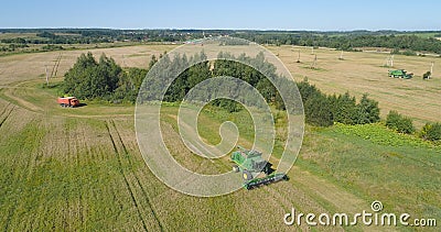 Combine harvester on wheat field Editorial Stock Photo