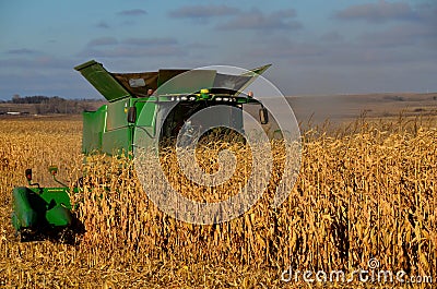 Combine harvesting corn crop in North Dakota. Editorial Stock Photo