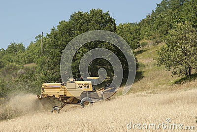 Combined Harvester On Hill Editorial Stock Photo