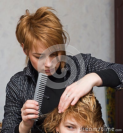 Combing hair Stock Photo