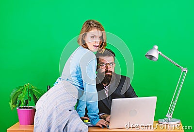 Combining their expertise. sexual harassment. data and information. businessman and assistant has problem. woman and man Stock Photo