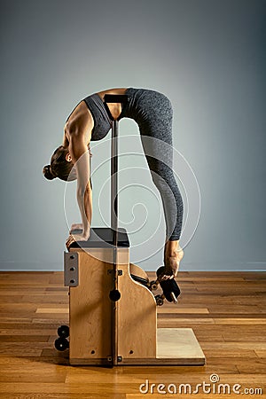 Combo wunda pilates chair woman instructor fitness yoga gym exercise. Copy space. sports banner Stock Photo