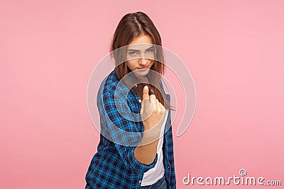 Come to me! Portrait of beautiful flirty girl in checkered shirt inviting to approach, making beckoning gesture Stock Photo