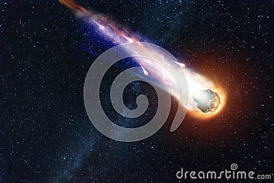 A comet, an asteroid, a meteorite falls to the ground against a starry sky. Attack of the meteorite. Meteor Rain. Kameta tail. End Stock Photo