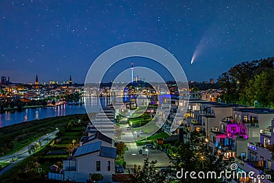 Comet C/2020 F3 Neowise in night sky over Phoenix Lake in Dortmund, Germany Editorial Stock Photo
