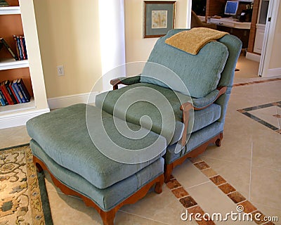 Comfortable Chair and Ottoman Stock Photo