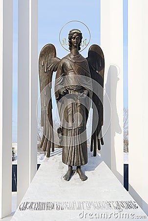 Comforting angel - fragment of monument to liquidators of Chernobyl accident. Omsk, Russia. Stock Photo