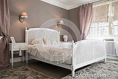 Comfy bedroom inside a residence Stock Photo