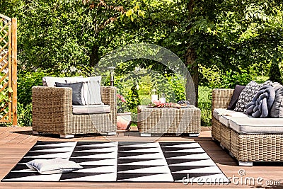 Garden furniture and rug Stock Photo