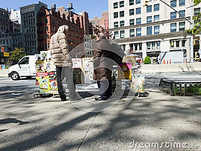 Comic book seller talking next to Flatiron building, new york Cartoon Illustration