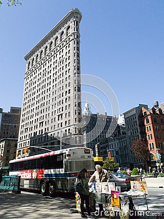 Comic book seller talking next to Flatiron building, new york Cartoon Illustration