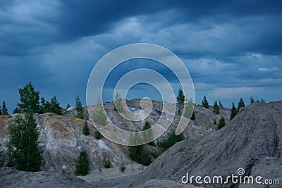 Coming rain at abandoned open cast Stock Photo