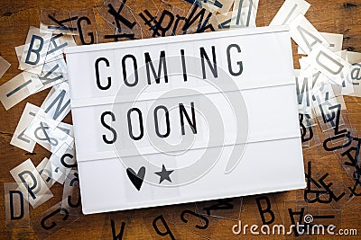 Coming Soon Text on Lightbox Stock Photo