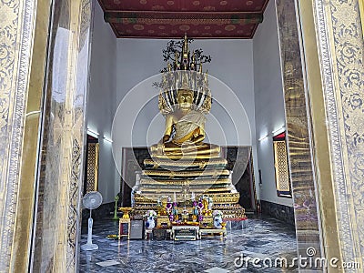 The commanding presence of the Phra Buddha Chinnasri Muninat in Wat Pho, Bangkok Editorial Stock Photo