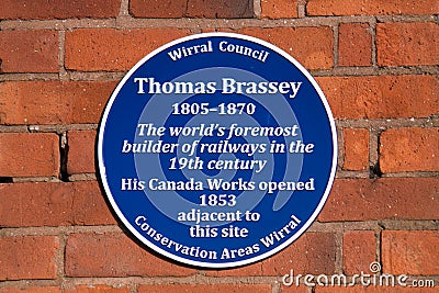 A commemorative blue plaque marking the location of the Canada Works site in Birkenhead, Wirral, UK Editorial Stock Photo