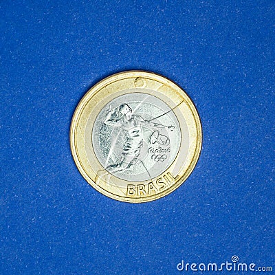 Commemorative `One Real` brazilian coin - volleyball - Olympics games `Rio 2016` Editorial Stock Photo