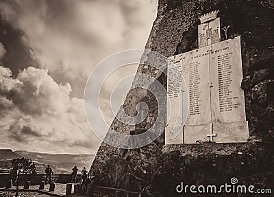 Commemorative plaque of second world war in alley of castelsardo old city Editorial Stock Photo