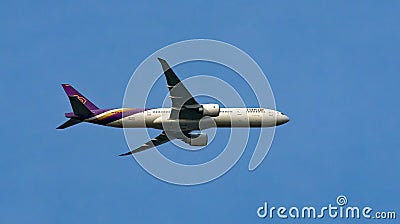 Commercial aircraft from the airline Thai, passing over southern Sweden Editorial Stock Photo