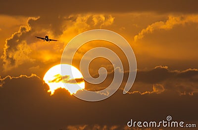 Commercial Aircraft On Approach Above Large Summer Stock Photo