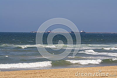 Commercial Boat Exiting Entrance to Durban Harbour Stock Photo