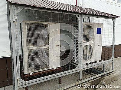 Commercial cooling HVAC air conditioner condenser fan units battery set climate control and refrigeration temperature AC Stock Photo