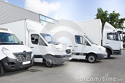 Commercial delivery vans park in transport parking place of transporting carrier shipping service Stock Photo