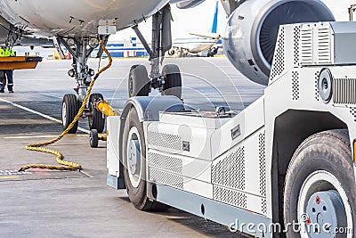 Commercial passenger airplane during push back operation Stock Photo